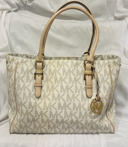 Borsa a tracolla da viaggio Michael Kors in pelle rivestita con monogramma Jet Set
