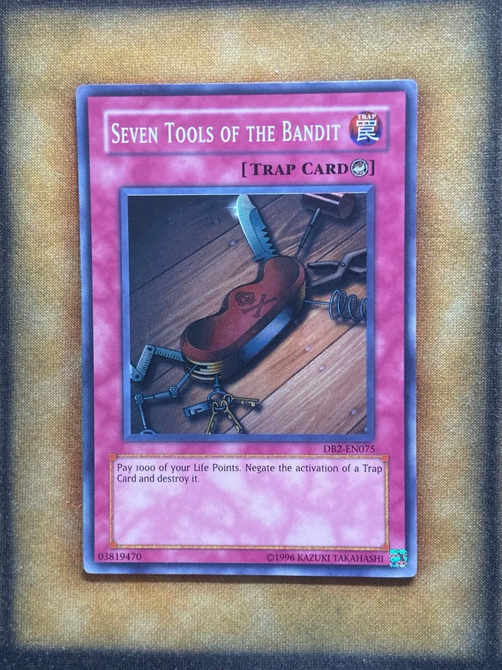 Yugioh Seven Tools of the Bandit DB2-EN075 Super Raro LP Foto 1 de 1