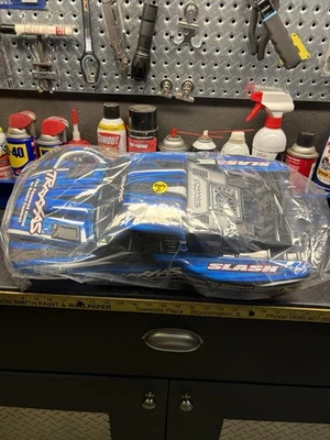 TRAXXAS SLASH OEM•ORIGINAL BODY SHELL: Clip Less / NEW - Image 1 of 4