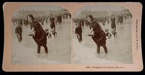RARE ANTIQUE Real Photo Kilburn Stereoview Wringing Wet Woman & Child Swimming - Bild 1 von 2