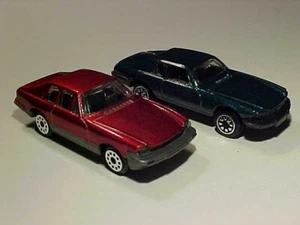 LOTTO 2x 3 POLLICI 1975 Jaguar XJ-S senza marchio 1/64 pressofuso come nuovo sfuso - Foto 1 di 7