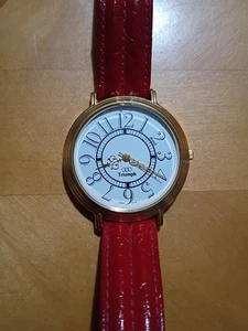 Triumph Uhr Damen Quarz Armbanduhr braucht Batterie - Bild 1 von 12