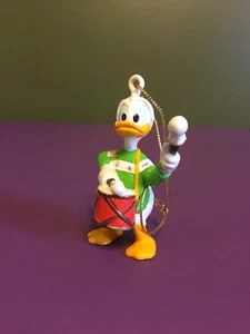 Adorno de Navidad vintage Walt Disney Co. Pato Lucas niño baterista - Imagen 1 de 4