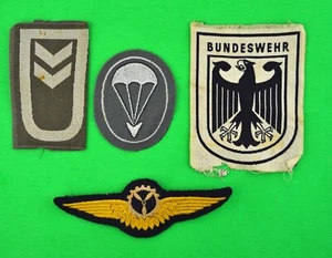 4 insignias alemanas de la Guerra Fría - este y oeste - Imagen 1 de 2