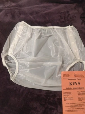 Pantalones de plástico estilo a presión para adultos Foto 1 de 4