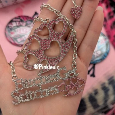Paquete de 2 collares Mcbling cubiertos de diamantes de imitación rosa nudillos de latón escena Y2k Foto 1 de 4