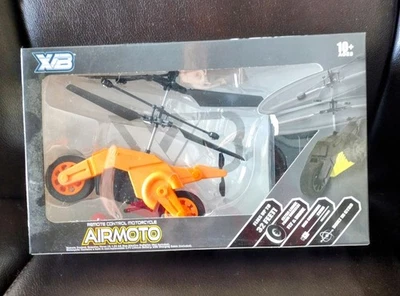 REMOTE CONTROL MOTORCYCLE AIRMOTO FLYS UP TO 32 FEET AGES 10+ FLY & DRIVE NEW - Image 1 of 2