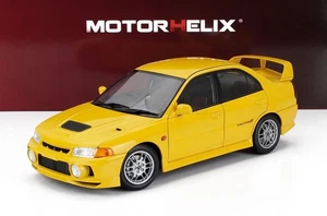 Motorhelix 1/18 Mitsubishi Lancer Evo IV With Engine 1999 Yellow M84006 - Picture 1 of 17