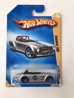 2009 Hot Wheels #33 New Models 33/42 TRIUMPH TR6 Silver Variation w/Blue 5 Spoke - Image 1 of 2