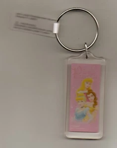 DISNEY MERCHANDISE NEW KEYCHAIN FEATURING PRINCESSES CINDERELLA, AURORA & BELLE - Picture 1 of 1