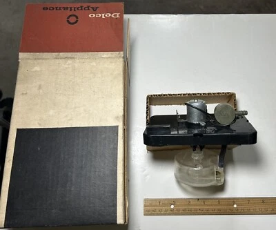 Bomba limpiaparabrisas ventana puerta trasera Oldsmobile 88, D88, S88 SW #4912930 NUEVO DE STOCK GM 1963-1964. Foto 1 de 4