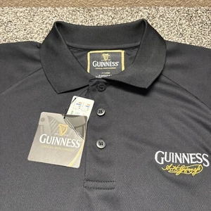 Polo Guinness uomo XL nera manica corta logo birra nuova con etichetta - Foto 1 di 12