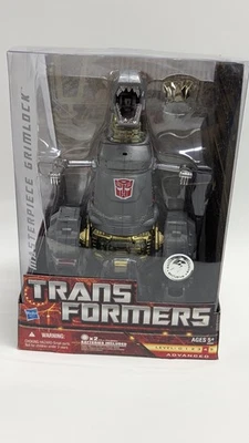 Obra Maestra Grimlock ToysRUs Exclusivo Transformers 2009 Estuche Fresco Sin Circular Foto 1 de 4