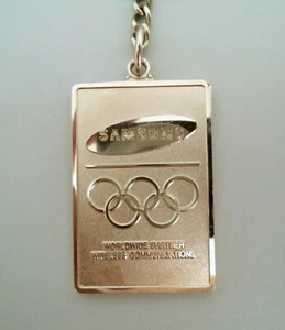 SAMSUNG - Worldwide Partner Wireless Communication. Olympic KeyHolder/KeyChain - Picture 1 of 2