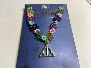 Harry Potter Pendant Gold Tone With seed Beaded Flower Stretch Necklace New - Picture 1 of 4