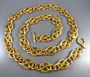Collar de cadena ancha vintage ANNE KLEIN AK NUDO DE AMOR ESLABONES PRETZEL tono dorado 36" - Imagen 1 de 4