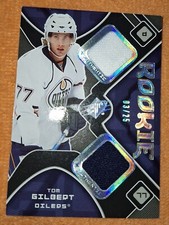 TOM GILBERT 2007-08 UPPER DECK SPX # 192 ROOKIE JERSEYS 25 MADE OILERS NEAR-MINT