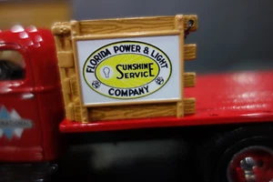 REDDY KILOWATT FLORIDA POWER 1ST GEAR STAKE TRUCK DIE CAST 1:34 Scale-RED - Picture 1 of 7