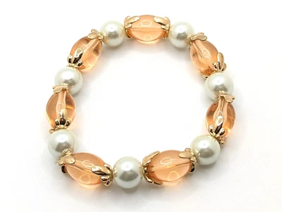 Pulsera elástica con cuentas de melocotón y perlas de plástico dorado blanco transparente Foto 1 de 4