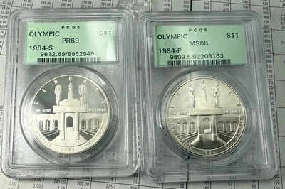 1984 Olympic Silver Dollar Set Proof & UNC PCGS PR69 & MS68 OGH Slabs - Image 1 of 4