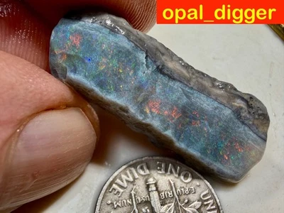 CORTADOR SUPERIOR AUSTRALIANO ÁSPERO MINTABIE ÓPALO NEGRO SUBASTAS ROJOS BRILLANTES 16 ct VIDEO Foto 1 de 4