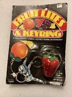 Porte-clés vintage rétro Fruit Lites flash lumière fraise kitsch neuf scellé