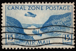 Canal Zone Airmail Stamp Scott # C10 - 15 Cents Blue Airplane Over Gaillard Cut - Picture 1 of 1