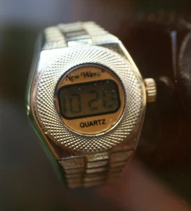 Vintage *NEW WAVE QUARTZ GOLD TONE FINGER WATCH WORKS WITH DATE, TIME AND TIMER* - Picture 1 of 13