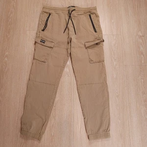 Hollister Skinny Cargo Joggers Uomo Beige Grande Elasticizzato Casual Tasche con Coulisse - Foto 1 di 11