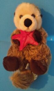 Plush Floating Brown Sea Otter Holding Red Starfish