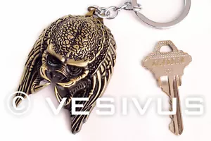 Schlüsselanhänger - Predator Alien Unmasked - BRONZE - Schlüssel Accessoire Schmuck Nerd Geek - Bild 1 von 1