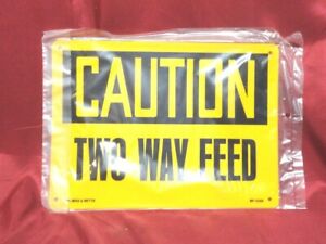 SAFETY SIGNAGE - Reads: - "CAUTION TWO WAY FEED" / 8" x 11" - SIGNAGE 