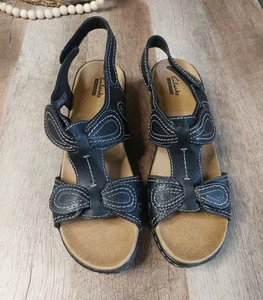 CLARKS Size 9.5M Black Lexi Walnut Q Leather Strappy Women Wedge Stitch Sandals - Picture 1 of 12
