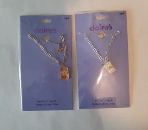 Claire's Taurus 2-Pack Pendant Necklace Silver & Gold Tone Set of 2 NEW - Picture 1 of 2