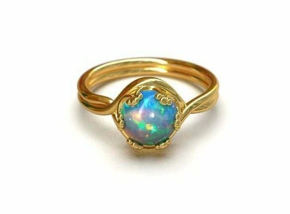 Anillo de compromiso de ópalo de oro de 14 quilates anillo de ópalo de oro de 1 quilate ópalo de fuego azul de alta calidad  Foto 1 de 4
