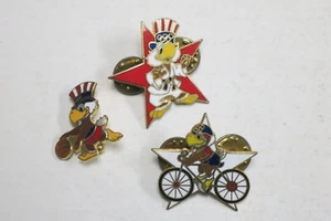 Lote de 3 pines olímpicos de Los Ángeles 1984 (ciclismo, judo, baloncesto) - Imagen 1 de 2