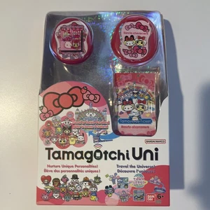 Bandai Tamagotchi Uni Sanrio Red Hello Kitty Bows English Edition, New Sealed - Picture 1 of 6