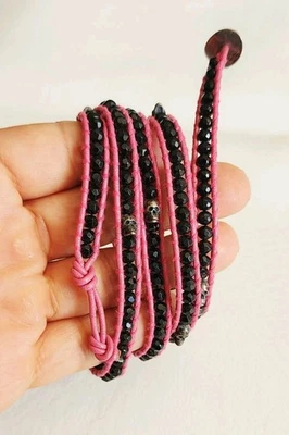 PULSERA CALAVERA PEPITA ÓNIX CUERO ROSA ENVOLVENTE CHAN LUU 32" Foto 1 de 4