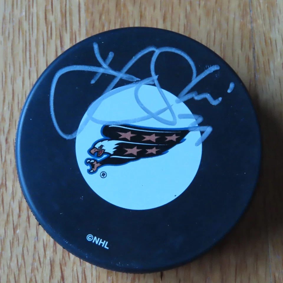 TJ OSHIE No. 77 signed WASHINGTON CAPITALS Puck COA - Image 1 of 1