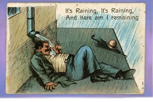 EARLY 1906 DRUNK GENT LAYING UNDER DRAIN RAINING PUB ALE BEER HUMOUR POSTCARD - Picture 1 of 2