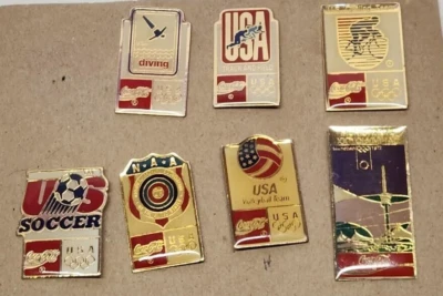 7 Coca Cola Olympic Pins 1992 Barcelona (6) & Munich 1972 (1) - Image 1 of 4