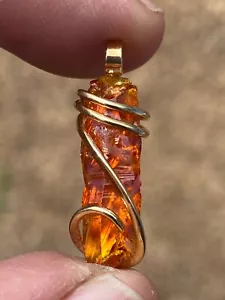 Ciondolo Polonia cristallo arancione zincato 15,56 ct in oro giallo forgiato 14 carati peso totale - Foto 1 di 12