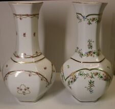 Two large Limoges vases, flower design, porcelain with gold trim