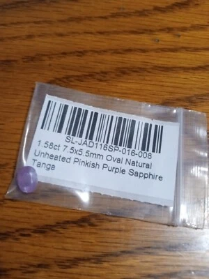 Bonito zafiro natural púrpura rosado sin calentar de 1,55 quilates con forma ovalada  Foto 1 de 4
