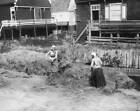 Two Women Haymaking Beside A Canal At Marken In The Netherlands 1930S Old Photo