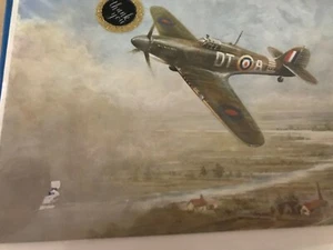 POSTCARD OF A SPITFIRE OVER AN ENGLISH VILLAGE - Picture 1 of 2