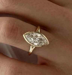 Anillo de compromiso corte marquesa 14x7 mm VVS1 bisel moissanita enchapado en oro amarillo de 14 k - Imagen 1 de 11