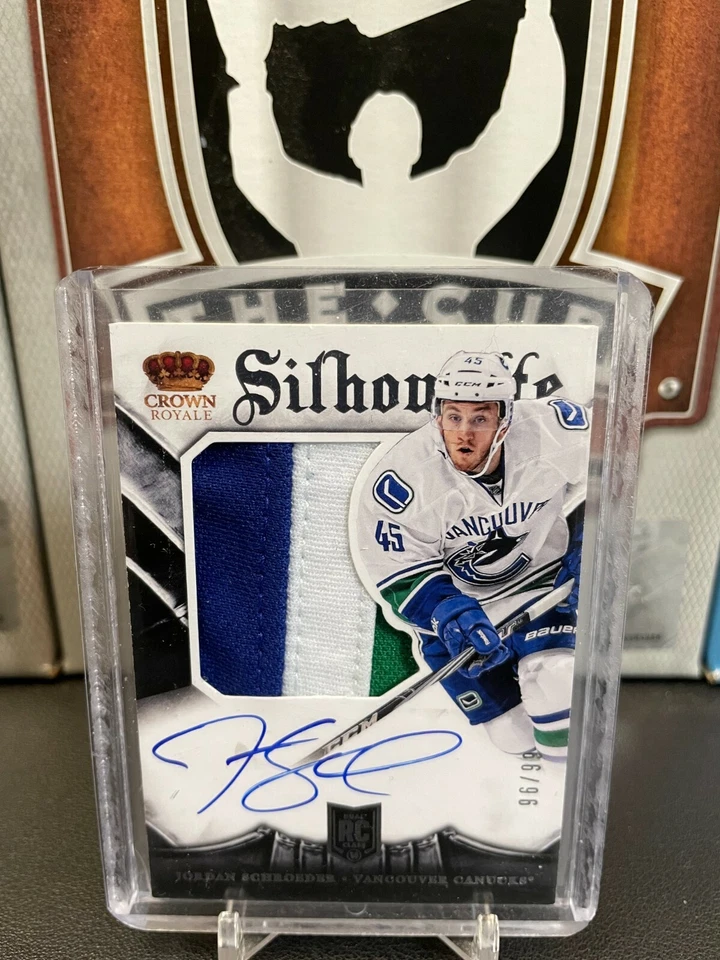 2013-14 Crown Royale #142 Jordan Schroeder JSY AUTOGRAPH RC 96/99 - Image 1 of 2