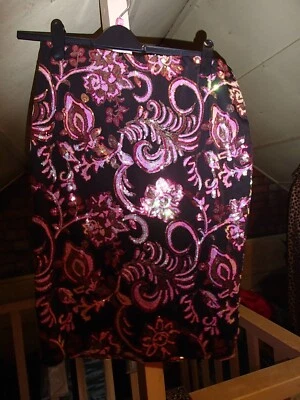 GEORGE pull on pink/black lined sequinned skirt size 16, length 26 inches - Image 1 of 3