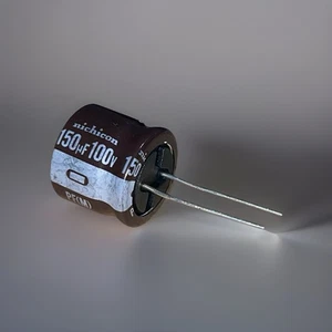 10 pezzi - NICHICON PF - 150uF 100V 105°C Giappone - Low ESR - Audio Industrie - NOS - Foto 1 di 2